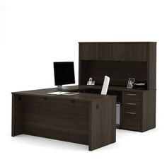 an office desk with two drawers and a computer monitor