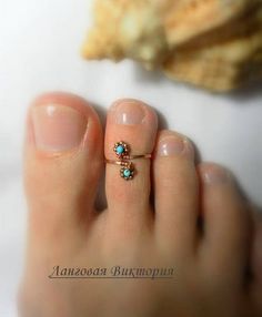 Ring on the toe. Made of silver 925 wire with brass fittings and natural turquoise. Size is adjustable. In the package You will receive one ring for the toe, which select from the options. Bright rings on the toe - very original jewelry for summer, beach season, perfect for every day, Dainty Toe Ring For Beach, Minimalist Toe Ring Jewelry For Beach, Summer Toe Ring Jewelry Gift, Summer Toe Ring Jewelry As A Gift, Dainty Adjustable Tiny Toe Rings, Adjustable Dainty Toe Rings, Bohemian Adjustable Turquoise Ring For Summer, Bohemian Beach Toe Rings, Bohemian Open Ring Toe Rings As Gift