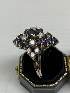 "14Kt White and Yellow Gold Diamond and Blue Sapphire Ring with a Professional 3900.00 appraisal. Ring size 9 1/2. Exact age unknown. This ring has been professionally appraised for $3900.00 and that written appraisal will accompany the ring when sold. Since I am not an expert regarding this item, I have relied on the expertise of the certified professional appraisal. The details about this ring are from a Certified Gemmologist-Certified Gold Smith appraisal and is shown in two of the pictures. Blue Sapphire Ring, Champagne Diamond, Blue Sapphire Rings, Diamond Pendant Necklace, Black Culture, Cultured Pearls, Collectable Items, Sapphire Ring, Blue Sapphire