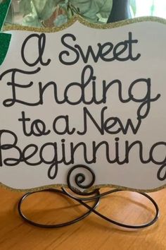 a sign that says, a sweet ending to a new beginning