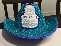 Turquoise glittered Hpnotic Liquor cowboy hat, rhinestone brim Liquor Themed Cowboy Hats Diy, Alcohol Hats, Crown Apple, Black Cowboy Hat, Turquoise Glitter, Black Cowboy, Diy Hat, Paint And Sip, New Mothers