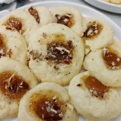 there are many small cookies on the plate