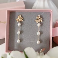 * DETAILS * -  Freshwater Pearls  - Gold Plated Brass Cherry Blossom Post Earrings 14mm 👉🏻For more earrings, see https://www.etsy.com/shop/JinnysJewelryBySeJin 🎁 A designer pull drawer pink gift box is available when the gift wrapping option is chosen. ------------------------------------------------- * CARE TIPS * - Perfumes: Be sure any perfume or lotions are completely absorbed into skin. - Hair products: Apply all hair products before putting on jewelry. - Swimming: Remove all jewelry bef Elegant Dangle Clip-on Flower Earrings, Elegant Clip-on Dangle Flower Earrings, Pearl Flower Dangle Earrings For Pierced Ears, Elegant Teardrop Earrings With Flower Charm, Elegant Flower Teardrop Earrings For Gift, Elegant Flower Shaped Clip-on Earrings As Gift, Elegant Flower Shaped Teardrop Earrings, Pearl Drop Earrings With Flower Charm, Flower Shaped Pearl Drop Jewelry For Anniversary