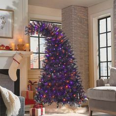 a decorated christmas tree in a living room