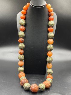 Beautiful vintage enamel beads with pumpkin shape carnelian bead necklace Artisan Single Strand Orange Beaded Necklace, Vintage Amber Jewelry With Large Beads, Vintage Large Beads For Jewelry Making, Hand-strung Orange Jewelry With Round Beads, Orange Hand-strung Jewelry With Round Beads, Artisan Orange Round Bead Jewelry, Antique Collectible Necklaces With Round Beads, Artisan Orange Jewelry With Round Beads, Unique Hand-strung Orange Necklace