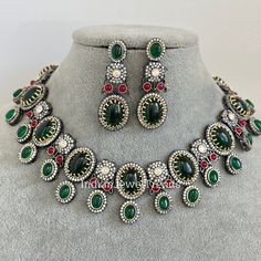 Emerald Green Sabyasachi Inspired Victorian necklace, Antique Zirconium Diamond Statement Jewelry Set, Indian Pakistani wedding Jewelry Regular Size And Adjustable Ships from California, USA Delivery in 2-5 business days in the USA. Other designs can be found here https://www.etsy.com/listing/1381240765/premium-quality-gold-plated-silver?click_key=e1a9e46c1ba3dcb2d7ddeb00610b709b7497bd62%3A1381240765&click_sum=5b5797e9&ref=shop_home_active_511&pro=1&frs=1&sts=1 https://www.etsy.com/listing/1266279586/premium-quality-gold-plated-silver?click_key=ac3f9678a67e3cb7b0f157cdf3d63e11bd1206cf%3A1266279586&click_sum=258e6572&ref=shop_home_active_20&pro=1&frs=1&sts=1 https://www.etsy.com/listing/1269817669/emerald-gold-victorian-uncut-polki?ref=listings_manager_grid Color, shades, and texture displa Green Kundan Necklace With Stone Setting For Wedding, Ornate Jeweled Necklaces For Wedding, Ornate Jeweled Wedding Necklaces, Traditional Emerald Necklace With Jewels For Wedding, Silver Jeweled Temple Necklace For Wedding, Silver Temple Necklace With Jewels For Wedding, Silver Emerald Necklace With Stone Work For Festive Occasions, Silver Emerald Necklace With Stone Work For Wedding, Green Necklace With Intricate Design For Wedding