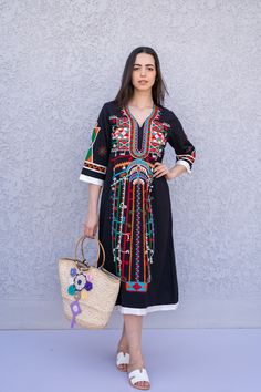 "This beautiful bohemian embroidered tunic dress is surely going to add life and oriental charm to your closet. The dress is made of Egyptian cotton which is widely renowned for its quality and texture. The dress is light and extremely soft and can be used on many occasions - beach, lounge, or even in your home to feel comfortable. Fabric : 70% Egyptian Cotton; 30% Polyester. Tunic measurements in inches : Small (Size 4/6 USA) Bust : 36-37 Hip : 40-41 Medium (Size 8/10 USA) Bust : 39-40 Hip : 45 Summer V-neck Embroidered Dress For Festive Occasions, Multicolor Embroidered Straight Kurta For Festivals, Eid Straight Kurta Dress With Multicolor Embroidery, Eid Multicolor Embroidered Straight Kurta Dress, Eid Multicolor Embroidery Straight Kurta Dress, Bohemian Maxi Dress With Resham Embroidery For Festive Occasions, Festive Bohemian Maxi Dress With Resham Embroidery, Bohemian Straight Kurta Dress For Eid, Traditional Maxi Dress With Multicolor Embroidery