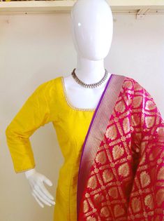 Raw silk kurta churidar set with banarasi brocade dupatta Designer Gold Anarkali Set In Katan Silk, Designer Katan Silk Churidar With Straight Kurta, Straight Kurta Churidar With Resham Embroidery In Katan Silk, Unstitched Banarasi Silk Anarkali Churidar, Katan Silk Churidar With Resham Embroidery, Anarkali Unstitched Suit In Banarasi Silk With Gota Work, Banarasi Silk Anarkali Salwar Kameez With Long Sleeves, Banarasi Silk Churidar With Dupatta For Navratri, Fitted Gold Banarasi Silk Salwar Kameez