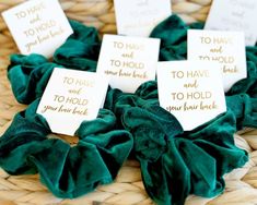 green velvet hair scrunches with gold foil lettering on them and to have and to hold your hair back