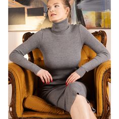 Knit Turtleneck Midi Dress - ALICE Material: Crafted from 100% merino wool for luxurious softness and warmth.   Colors Available: Grey, black, and dark blue (navy).   Sizes: XS, S, M, L, XL. The model, standing at 172 cm (5'65"), is wearing a size S. Features of the ALICE Knit Midi Dress: - Turtleneck design - Fine knit texture - Fitted silhouette - Long sleeves - Midi length Experience the perfect blend of elegance and comfort with the ALICE Knit Midi Dress, ideal for any occasion. www.kristael Fitted Gray Merino Wool Sweater, Elegant Gray Knitted Sweater, Fitted Wool Sweater Dress For Winter, Model Standing, Merino Wool Dress, Turtleneck Midi Dress, Chic Summer Style, Turtleneck Dress, Knit Texture