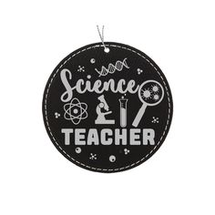 a black and white ornament that says science teacher