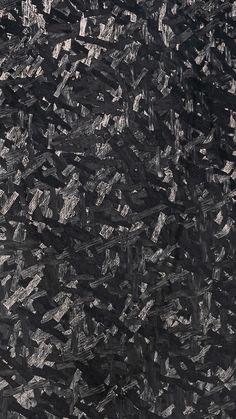 an abstract black and white painting with lots of small squares on it's surface