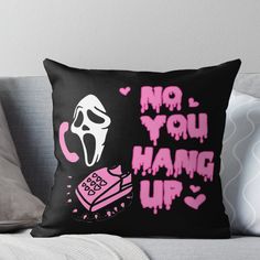 a pillow with the words no you hang up on it and a ghost holding a pink heart