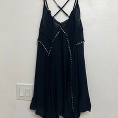 Free People Black Dress, No Tags But Never Worn. Black With Metal Accents On Front And Back Of The Dress, Falls Right Above/Or At The Knee, With Adjustable Straps For A Perfect Fit! Note: This Dress Is Sheer, So Needs Some Type Of Under Garments, Can Also Be Used As A Bathing Suit Cover Up! Free People Black Dress, Under Garments, Bathing Suit Cover, Bathing Suit Cover Up, Metal Accents, Free People Black, Free People Dresses, Asymmetrical Dress, Free People Dress