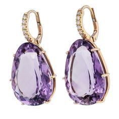 Introducing our exquisite Amethyst and Diamond Pave drop earrings, a true treasure from our exclusive H&H Collection. Prepare to be captivated by their radiant beauty as they effortlessly infuse your style with an enchanting sparkle that demands attention. Crafted with passion, these earrings boast 48.15ct high-quality amethyst drops that radiate with enchanting energy. Accentuating their charm are 12pcs of 0.20ct F-G VS2 Diamond Pave, delicately ascending up the bail and set in 18kt rose gold. Formal Diamond Earrings With Gemstone Accents, Briolette Diamond Accent Earrings For Formal Occasions, Elegant Diamond Earrings With Gemstone Accents For Formal Occasions, Luxury Amethyst Earrings With Gemstone Accents, Elegant Formal Diamond Earrings With Gemstone Accents, Formal Briolette Earrings With Diamond Accents, Formal Rose Gold Earrings With Gemstone Accents, Luxury Amethyst Teardrop Earrings, Formal Briolette Diamond Accented Earrings