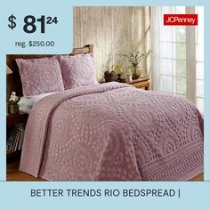 a bed with pink bedspread and pillows on it for $ 814 reg $ 350 00