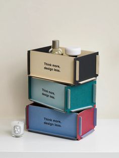 three books stacked on top of each other with the words think more, design less