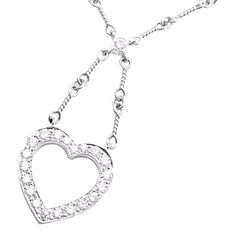 About This Piece:  Metal: Platinum  Measurements:  Chain Length: 16.5"  Drop: 1 1/4"  Weight: 11.3 grams  Pendant:  Stones: 17mm x 16mm Round brilliant cut diamonds VS1 clarity, G color total weight approx. .67ct  Hallmarks: Tiffany & Co PT950    Please refer to the dimensions in the description above for accurate measurements. Please reach out to the seller with any questions on dimensions or fit prior to purchase. Diamond White Heart Pendant Necklace With 17 Jewels, Luxury Heart-shaped Diamond Necklace With 17 Jewels, White Gold Heart Cut Diamond Necklace With 17 Jewels, Formal Diamond Heart Necklace With Heart Charm, Formal Diamond Heart Necklace With Charm, Formal Diamond Heart Charm Necklace, Formal White Gold Heart Necklace With Single Cut Diamonds, Luxury White Gold Heart Cut Diamond Necklace, Heart-shaped Cubic Zirconia Diamond Necklace