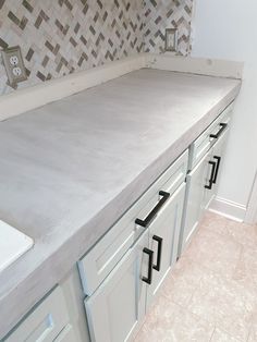 a kitchen counter that has some drawers on it