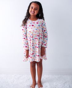 This dreamy dress is made to make any toddler twirl with joy! Soft bamboo fabric and long sleeves keep them comfy and stylish while they explore, frolic, and flutter through their day! Who said playtime has to be boring? 93% Bamboo and 7% spandex Wash cold with like colors; stays soft wash after wash Long Sleeve Twirl Ready