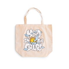 front view image of tote bag from Bather that reads head in the clouds in bubbled text with a drawing of a sun in the middle Large Beige Canvas Bag, Summer Cotton Shoulder Bag For Everyday, Eco-friendly Canvas Weekend Bags, Everyday Summer Cotton Shoulder Bag, Eco-friendly Canvas Bag For Weekend, Vacation Beige Cotton Shoulder Bag, Cotton Summer Beach Bag, Summer Weekend Cotton Beach Bag, Beige Cotton Vacation Bag