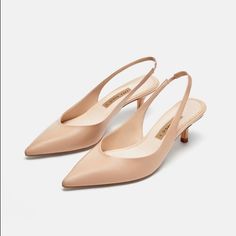 Genuine Zara New With Tag Material: Leather Upper Color: Nude Beautiful Nude Color..... Comfortable 1.9 Inch Heel... Great For Office Or With A Pretty Dress.. Euro Size 38 (7.5), 41(10) Beige Pointed Toe Slingback Pumps With 4-inch Heel, Beige Low-heel Slingback Sandals With Padded Heel, Cream Slingback Pumps With Branded Heel, Beige High Heel Slingback Pumps For Spring, Beige Low Heel Slingback Sandals With Padded Heel, Feminine Leather Kitten Heels, Cream Slingback Pumps With 4-inch Heel For Spring, Beige Slingback Heels For Spring, Beige Closed Toe Slingback Pumps For Spring