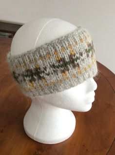 Hand knitted Fair Isle Headband.  Made with Icelandic Lopi Wool.  54cm / 21.25" diameter, 10cm / 4" height.  Grey background colour with green, brown, mustard pattern.  Hand wash in warm water, squeeze dry and dry flat. Fair Isle Headband, Motif Fair Isle, Brown Mustard, Turban Headbands, Grey Background, Fall Collection, Turbans, Fall Collections, Hair Accessories Headbands