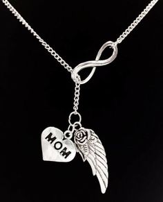 What a stunning necklace! Silver tone charms on 18" chain with lobster clasp. "Y" style. Infinity charm is approx. 1" and wing charm is approx. 31mm. Very unique! I can adjust the length of chain if you prefer a different length. The chain is made of silver plated alloy.-Ships with gift packaging.-Invoices are not included in packages unless requested.-Birthstone charms can be purchased for this piece with this link:  https://www.etsy.com/listing/195923344-Initial/ Letter charms can be purchased Mother's Day Adjustable Metal Charm Necklaces, Adjustable Metal Charm Necklaces For Mother's Day, Mom Memorial, Mom In Heaven, Remembrance Necklaces, Necklace Mom, Sister Necklace, Infinity Charm, Best Friend Jewelry