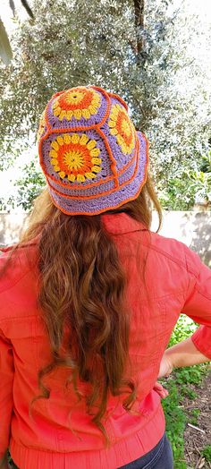 NEW SPRING/SUMMER CREATION Lilac and orange colored granny square floral crochet bucket hat. Cute and stylish granny square bucket hats hand crocheted with trendy color palettes in 2024. ✔️ DESIGN: These hats are  great for spring /summer, holidays, and festivals. They have stylish look in vintage, boho style, great with any outfit, suited for outdoor activities, and casual wear in bright colors .They are a nice treat for yourself, as well as thoughtful presents for friends or valentines. ✔️ QUA Orange Brimmed Bucket Hat For Spring, Yellow Bohemian Crochet Hat For Spring, Orange Bohemian Bucket Hat, Retro Orange Bucket Hat, Summer Retro Crochet Bucket Hat, Retro Crochet Summer Hat For Vacation, Retro Crochet Hat For Spring Vacation, Beach Bucket Hat With Granny Square Crochet, Retro Crochet Bucket Hat For Vacation