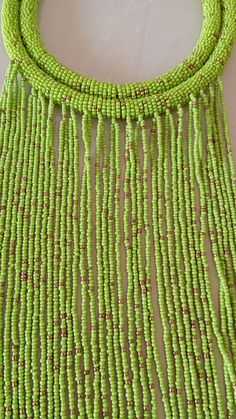 Green African Beaded Necklace, African Jewelry, Handmade necklace, Masai Necklace, Tribal Jewelry, Women Necklace, Christmas giftt This elegant statement necklace is made of fine Beads. 100% handmade Closure: hook Color: Green. Available in different colors, please select on the color option shown. Neck width: 17 inches Fringe width 16 inches 3-5 days delivery via DHL Express The shipping fee is for the first item only and additional items ship for free. For any clarification ...please send an e Green Polished Beads Necklace For Festivals, Green Polished Beaded Necklace For Festival, Green Necklace With Spacer Beads For Festivals, Green Festival Necklace With Spacer Beads, Green Necklaces With Spacer Beads For Festivals, Green Beaded Necklaces With Dangling Beads For Party, Green Beaded Necklace With Dangling Beads For Party, Green Large Beads Necklace For Festival, Green Handmade Round Beads Choker