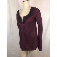 --Free People Thermal Blouse --New With Tags --Misses Size Large --Wine Colorway --Thermal Waffle Knit Fabric With Mesh And Fuzzy Yarn Embellished Yoke --Button Front Detail --Long Sleeve --Style F535u593 --Body: 65% Polyester, 35% Rayon; Mesh: 100% Polyester; Fuzzy Yarn: 100% Acrylic --Approx. Measurements: Bust: 35", Length: 26", Sleeve Length: 28" Fitted Red Tops With Lace Trim, Fitted Red Top With Lace Trim, Fall Cotton Tops With Lace Trim, Red V-neck Top With Lace Trim, Bohemian Fitted Winter Tops, Fitted Bohemian Tops For Winter, Red Bohemian Tops With Lace Trim, Bohemian Red Tops With Lace Trim, Red Stretch Bohemian Top