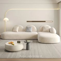 a modern living room with white furniture and accessories