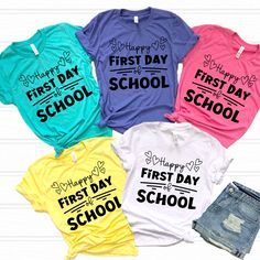 four shirts that say happy first day school and the other three are in different colors