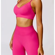 The B|FIT TRACK Sport Bra offers a supportive and stylish solution for your active lifestyle. With a criss cross back design for added support and comfort, this sport bra is perfect for any workout. Stay on top of your game with this must-have fitness essential. Yoga Activewear With Built-in Push-up Bra, Athleisure Push-up Sports Bra For Workout, Sporty Strappy Back Gym Bra, Strappy Back Sports Bra With Built-in Bra For Gym, Athleisure Push-up Sports Bra For Gym, Push-up Activewear With Built-in Bra For Sports, Compressive Push-up Sports Bra For Gym, Push-up Bra Friendly Activewear For Yoga, Sportswear Strappy Back Sports Bra With Light Support