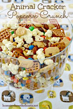 an animal cracker popcorn crunch in a glass bowl