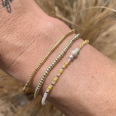 small gold seed bead bracelet strung on elastic please gently roll on and off to prolong its life handmade in venice, ca Seed Bead Bracelets, Real Gold, Delicate Bracelet, Seed Beads, Gold Bracelet, Beaded Bracelets, Beads, Gold