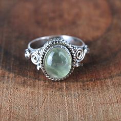 Prehnite Gemstone Ring, 925 Silver Ring, Vintage Ring, Dainty Ring, Prehnite Jewelry, Gift For Her, Women Ring, Wedding Ring, Gift For Mom. Material: 925 Solid Sterling Silver Gemstone: Natural Prehnite Stone Shape: Oval Stone Size: 7x9 mm Weight: 3.00 GM Genuine 925 Solid Silver Handmade Ring Lowest Price Guaranteed ''Spring Trends'' THIS ALL DESIGN IS CRATED BY ARTISANSILVERINDIA ITS ORIGINAL DESIGN NO OTHER SITE IS SELLING THIS !! One-Of-Kind Item !! !! Artisan jewelry !! !! Halloween !! !! Christmas Day !! !! Christmas Offer !! !! Etsy Cyber 2020 !! Jaipur Silver 925 !! Best Seller bridesmaid Gift !! !! personalized jewelry  !! Birth Stone Earring !! Boho Magic Silver Boho Magic Silver Jewellery personalized gift best_friend_gifts A one-of-a-kind community Peace of mindetsy-gift-guides Crystal Silver Rings, Green Sterling Silver Amethyst Ring For Wedding, Handmade Elegant Green Moonstone Ring, Elegant Handmade Green Moonstone Ring, Green Amethyst Ring In Sterling Silver, Green Amethyst Sterling Silver Ring Gift, Green Oval Prehnite Rings, Green Gemstone Toe Ring, Adjustable Green Moonstone Ring In Sterling Silver