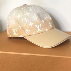 Louis Vuitton Baseball Cap Collection: Limited Edition By The Pool Color: Peach Mist Ombr Nwt- New With Tag Size: Large Priced For Posh Fees Discounts Avail Priced For Each But Message To Discuss Discount For Both. The Matching Large Shawl That Can Be Tied Around The Waist! Please Message If Interested. I Have Them Listed So You May Select Here. Product Details: 47.2 X 47.2 Inches (Length X Height) Color: Peach Mist Ombr 60% Silk, 40% Wool Inkjet Print Monogram Pattern Hand-Rolled Edges Dry Clea Designer White Visor Baseball Cap, Luxury White Baseball Cap, Luxury White Snapback Hat, Luxury Beige Baseball Cap, Luxury Beige Visor Baseball Cap, Designer Beige Cap, Designer Beige Baseball Cap, Luxury Brown Baseball Cap With Curved Visor, Luxury Beige Baseball Cap With Curved Brim