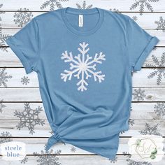 Light up your winter wardrobe with our Glitter Snowflake Shirt. This sparkly and stylish top is perfect for holiday events or adding a touch of glamour to your everyday winter attire. Celebrate the winter season in style with our Glitter Winter Shirt. Featuring a sparkling design, this festive top is ideal for holiday parties or adding some glam to your winter look. Handmade with love, Stacia <3  *We offer custom prints on all types of products! 🛍️ Check out some other options in my store!! https://scalaco.etsy.com/ 💕 Follow @scala_co on socials for more inspiration! 🌟 ----------------------------------------------------------------- ✨ Style Essentials! ✨ ✓ Handmade, designed and printed in the USA with love! 🇺🇸 ✓ High quality material with durable print. ✓ Super soft, stylish, and ec Winter Glitter Long Sleeve Tops, Glitter Long Sleeve Winter Tops, Glitter Long Sleeve Tops For Winter, Long Sleeve Glitter Tops For Winter, Long Sleeve Glitter Top For Winter, Winter Glitter Print Crew Neck Top, Winter Crew Neck Top With Glitter Print, Blue Glitter Print Crew Neck Tops, Blue Crew Neck Tops With Glitter Print