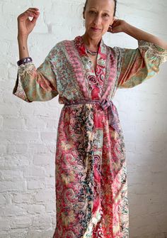 "This is one of a kind patchwork, upcycled silky robe Made free size with wrap tie closing and wide kimono sleeves  Easy and fun to wear around the house or outside as a urban boho style,  flowy kardigan with jeans and tshirt  It is very comfy and feels soft and light  the material is colourful and free flowing  made into this unique stylish over all MEAESURE free size length 55\" MATERIAL *polyester and silk *no lining more boho style ideas available at  https://www.etsy.com/shop/AltheaStores? Urban Boho, Boho Robes, Patchwork Kimono, Silky Robe, House Coat, Kimono Sleeves, Boho Lace, Free Flowing, Womens Robes