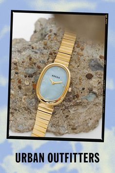 Inspired by days spent in the sun by the water and followed by evenings of indulgence. The Jane carries a delicate 23mm oval case, mother of pearl dial and stainless steel bracelet that fastens with a jewelry clasp. An effortlessly elegant and classic style. Content + Care Stainless Steel Wipe clean with cloth Imported Size + Fit 26mm x 7mm | BREDA Jane Watch in Gold/Blue, Women's at Urban Outfitters Jewelry Clasps, Steel Bracelet, Stainless Steel Bracelet, Mother Of Pearl, Cleaning Wipes, The Sun, Classic Style, Urban Outfitters, Sun