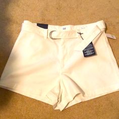 White Belted Jean Shorts With Some Stretch Gap High Waist Shorts For Summer, Gap High Waist Shorts For Spring, Gap High-waisted Summer Shorts, Gap Fitted Cotton Shorts, Gap Fitted Short-length Bottoms, Gap Fitted Short Length Bottoms, Fitted Cotton Shorts By Gap, Fitted Gap Bottoms Short Length, Gap White Cotton Bottoms