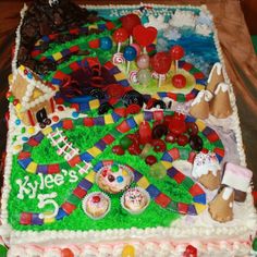 a large cake decorated with candy and candies