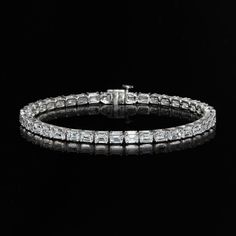 Ross-Simons - 10.00ct t. w. Emerald-Cut Lab Grown Diamond Tennis Bracelet. 7". Treat yourself to big, beautiful sparkle at an incredible value. Our exceptional 10.00 ct. t. w. emerald-cut lab-grown diamond tennis bracelet is a modern take on a classic style you crave. Finely crafted in polished 14kt white gold. Lab-grown diamonds are identical to mined diamonds according to their optical, physical and chemical properties. All Ross-Simons lab-grown diamond jewelry in 14kt gold and platinum includes an IGI Laboratory-Grown Diamond Report to verify color, clarity and carat weight. Single-latch safety. Push-button clasp, lab-grown diamond tennis bracelet. Diamond birthstones are the perfect gift for April birthdays. Luxury Platinum Tennis Bracelet With 17 Jewels, Luxury Silver Emerald Cut Diamond Bracelet, Evening Diamond Tennis Bracelet With Brilliant Cut, Formal Emerald Cut Diamond Bracelet With Single Cut Diamonds, Silver Emerald Cut Diamond Bracelet For Formal Occasions, Dazzling Baguette Cut Diamond Bracelet For Formal Occasions, Formal Dazzling Diamond Bracelet With Baguette Cut, Luxury Diamond Bracelet With Asscher Cut, Platinum Tennis Bracelet With Baguette Cut Prong Setting