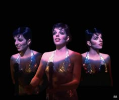 three women wearing sequins and holding microphones in front of a black background