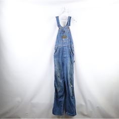 Vintage 50s 60s Womens 26 Thrashed Sanforized Cotton Flared Denim Overalls Usa Womens Overalls Thrashed. Distressed And Faded. Has Stains All Over. Usa Made Womens 26 Measurements Are: 13.5 Inches Across The Waist 34 Inch Inseam 61.5 Inches From Top To Bottom 9.75 Inch Leg Opening Blue Cotton Check Out My Other Items In My Store! I272 Retro Denim Blue Overalls, Denim Blue Retro Overalls, Retro Medium Wash Cotton Overalls, Vintage Denim Blue Overalls, Vintage Medium Wash Overalls, Fitted Medium Wash Cotton Overalls, Vintage Fitted Cotton Jeans, Vintage Blue Cotton Overalls, Blue Pre-washed Fitted Jeans