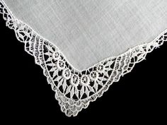 New old stock, unused vintage wedding hanky with appliqued lace borders and all four corners. Measuring 11 inches with a white cotton center. Lace Handkerchiefs With Lace Trim For Wedding, Lace Wedding Handkerchiefs With Lace Trim, Classic White Lace Handkerchiefs, Classic White Lace Handkerchief, Classic White Lace Work Handkerchiefs, White Victorian Handkerchiefs With Lace Trim, Victorian White Handkerchiefs With Lace Trim, White Victorian Handkerchief With Lace Trim, Vintage Lace Trim Handkerchiefs For Wedding