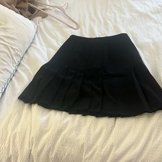 Gently Used Akris Black Pleated Skirt Size 10. Elegant Full Tennis Skirt With Lining, Pleated Formal Skort, Formal Pleated Flared Mini Skirt, Pleated A-line Mini Skirt For Night Out, Formal Pleated Skort, Formal Pleated Skirted Skort, Black A-line Pleated Skort, Formal Pleated Flowy Mini Skirt, Elegant A-line Tennis Skirt With Lining