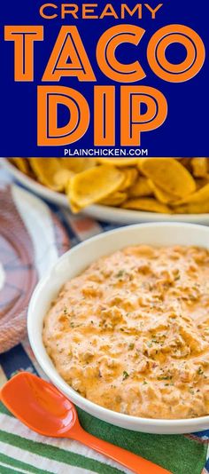 creamy taco dip in a white bowl with tortilla chips on the side