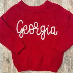 Be ready for game day or just show some school spirit with a hand embroidered collegiate sweater! These can be done in classic school colors or with any available color combination of your choosing. Just choose your colors in the personalization field during checkout.  If you don't see exact colors for your university, please message me, I would love to source something for you!  Yarns are 100% cotton and sweaters are 100% cotton or an acrylic blend based on selection. Sweaters have an oversized fit and ordering true to size will still give you plenty of room.  Care instructions: wash on delicate inside out and hang to try. Tumble inside out to soften. Avoid anything that might snag such as zippers or hooks. Game Day Sweater, Embroidery Sweater Diy, Hand Embroidered Sweater, Embroidery Sweater, Embroidered Sweater, White Embroidery, School Colors, Embroidered Sweatshirts, Embroidery And Stitching